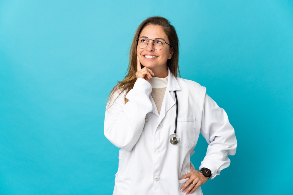 Doctor wondering and smiling